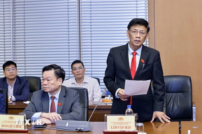 ttxvn-2402-chu-tich-quoc-hoi-lam-viec-hoi-dong-dan-toc-quoc-hoi-5.jpg