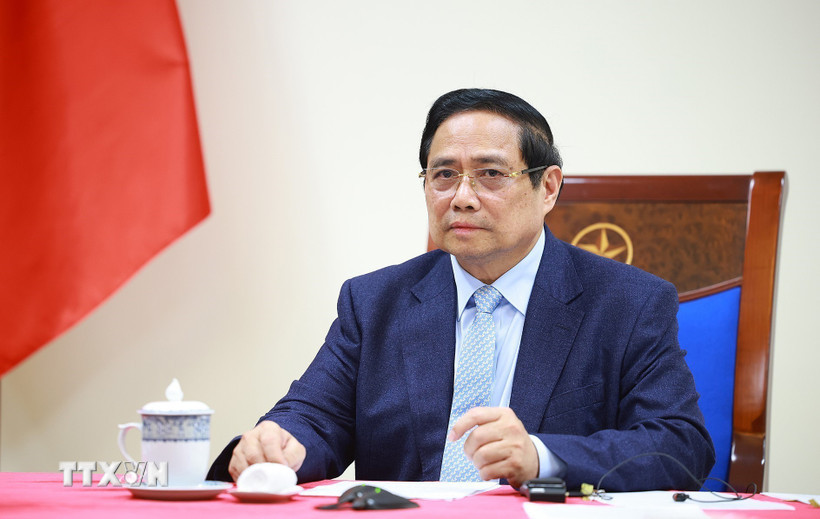 Thủ tướng Phạm Minh Chính điện đàm với Thủ tướng Kuwait Sheikh Ahmad Abdullah Al-Ahmad Al Sabah. (Ảnh: Dương Giang/TTXVN)