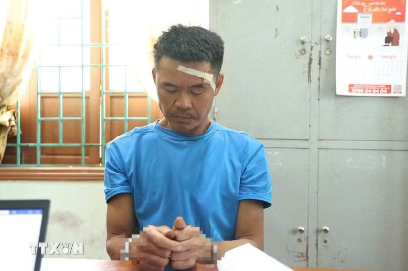Đối tượng Trần Hoàng Diệu tại cơ quan điều tra. (Ảnh: TTXVN phát)