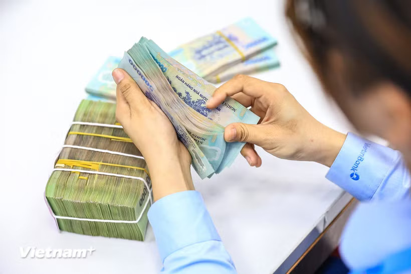 Ngân hàng Nhà nước nâng trần tỷ lệ cho vay trên tiền gửi lên 95%. (Ảnh: Vietnam+)