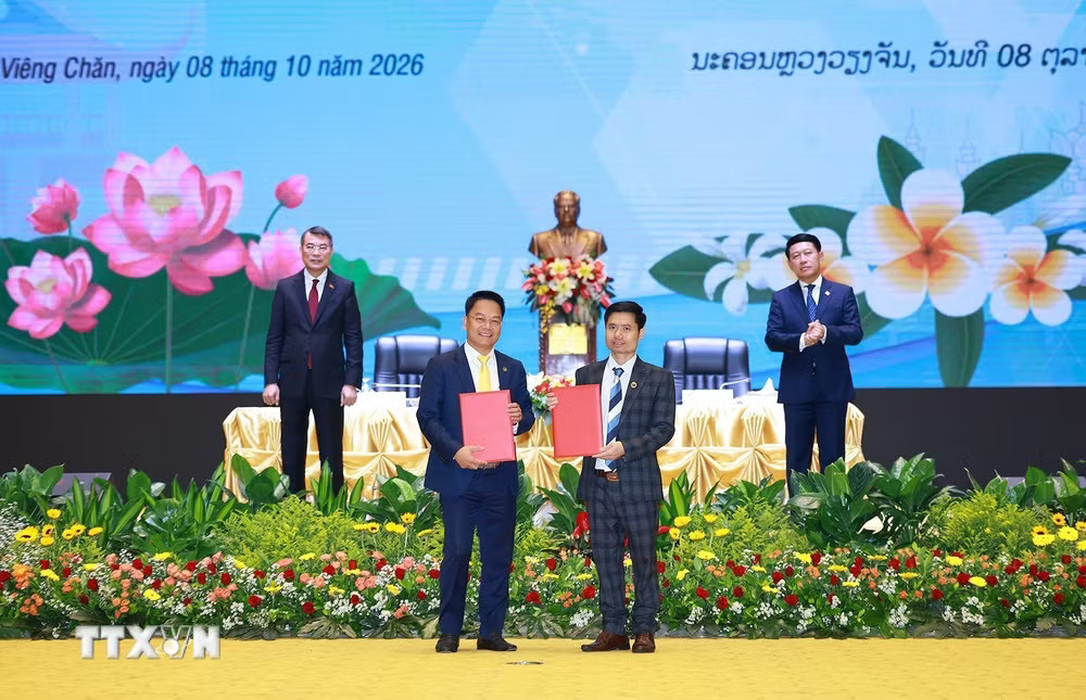 ttxvn_thu-tuong-le-minh-hung-va-thu-tuong-lao-dong-chu-tri-hoi-nghi-xuc-tien-dau-tu-viet-nam-lao-8.jpg