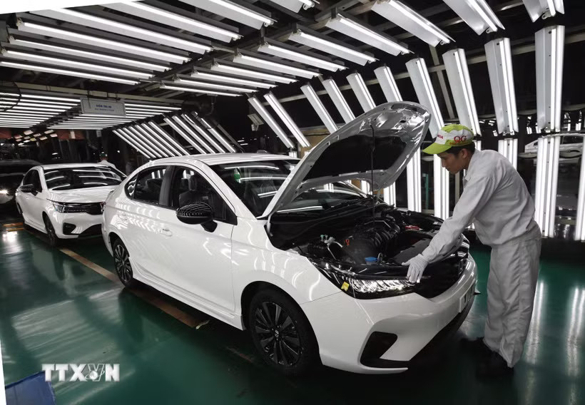 Sản xuất xe ôtô tại nhà máy Honda Việt Nam, phường Vĩnh Phúc, Phú Thọ. (Ảnh: Trần Việt/TTXVN)