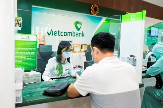 Vietcombank tien phong giam dong loat 1% lai suat cho vay VND hinh anh 1