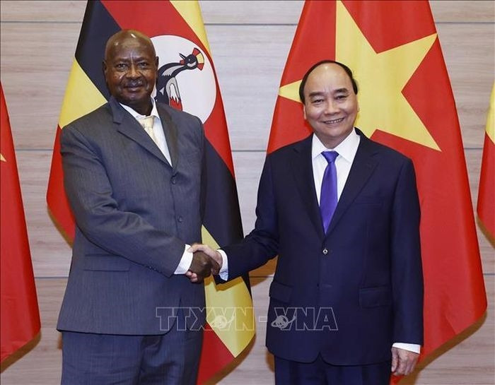 Chủ tịch nước Nguyễn Xuân Phúc và Tổng thống nước Cộng hòa Uganda Yoweri Kaguta Museveni. Ảnh: Thống Nhất/TTXVN
