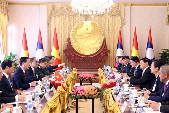 Vietnam, Laos to further expand economic, science cooperation