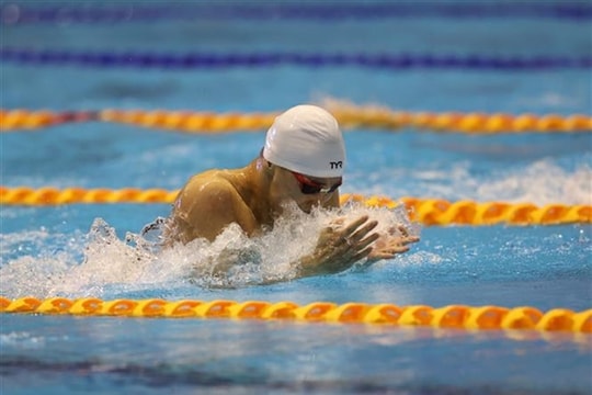 Swimmer Bao wins gold, sets new SEA Games record