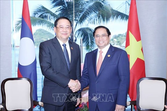 Thủ tướng Phạm Minh Chính gặp Thủ tướng Lào Sonexay Siphandone