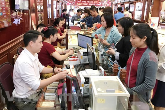 Giá vàng SJC trong nước giữ ổn định, tỷ giá trung tâm đi xuống