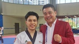 Trần Hồ Duy nhận huy chương đồng môn Taekwondo