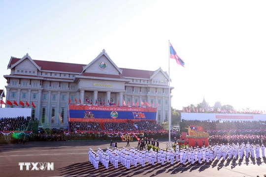 Kỷ niệm trọng thể 50 năm Quốc khánh nước Cộng hòa Dân chủ Nhân dân Lào
