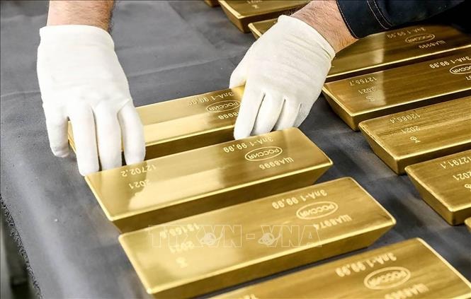 Giá vàng thế giới tăng gần 60 USD mỗi ounce