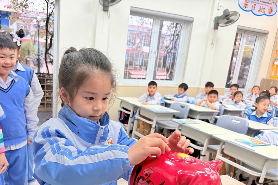Nuôi lợn tiết kiệm, gieo yêu thương từ tiền mừng tuổi
